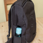 Smaller drinks bottles, under 2cm high, fit snugly.